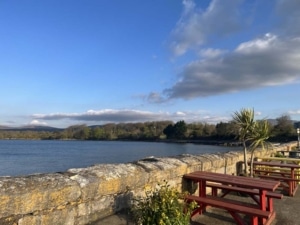 Irish landscape with red picnic tables